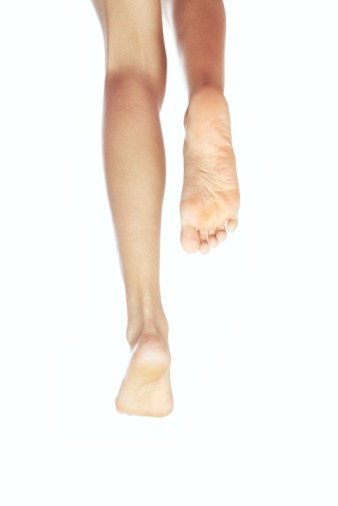 Shoeless runner feet legs